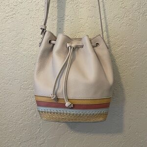 The Sak / genuine leather cream drawstring bucket bag straw